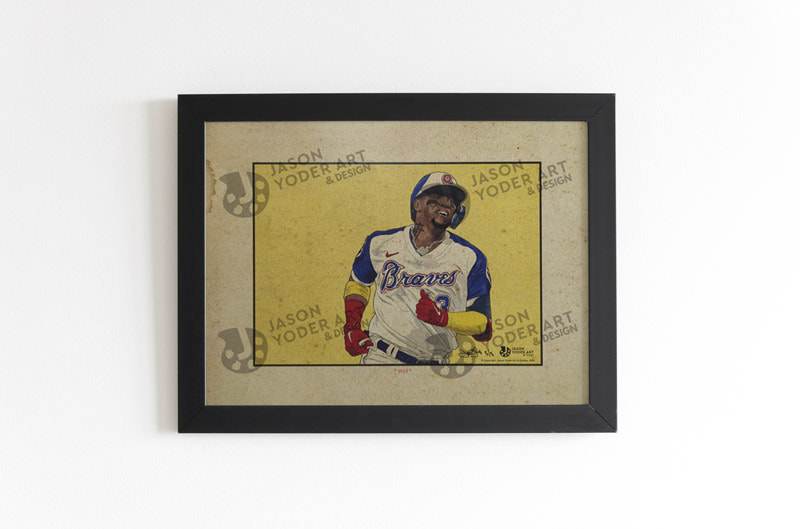 Limited edition Ronald Acuna, Jr. print, mocked up in a black frame and hanging on a white wall.